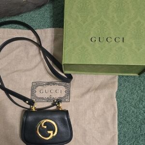 Gucci Black Leather Mini Crossbody with Gold GG Emblem